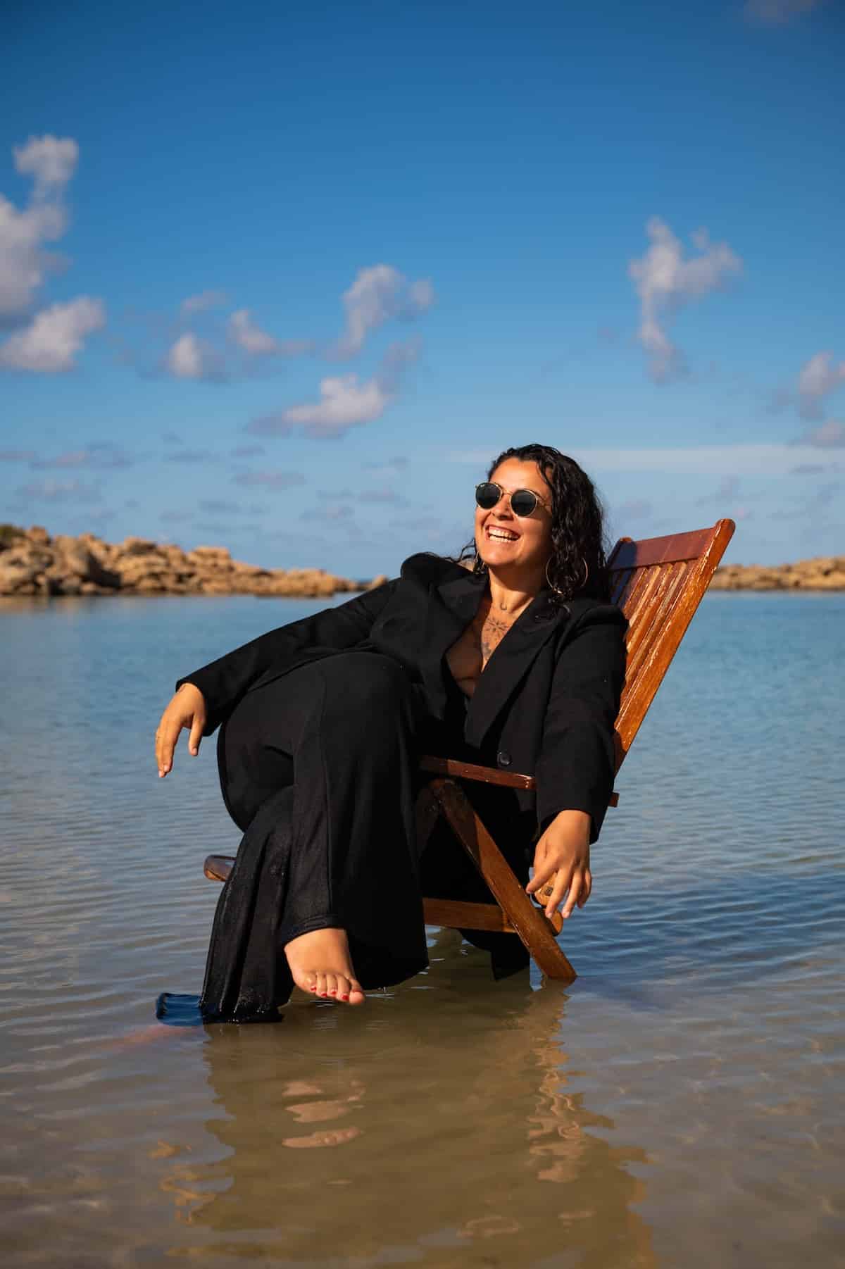 Portrait seated in shallow sea water, Crete